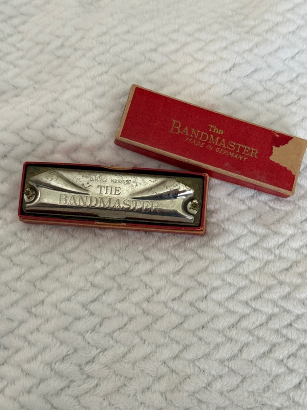 The Bandmaster Harmonica in Red Case Vintage